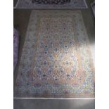 A hand knotted Fine Kashan woollen rug - 2.23m x 1.40m