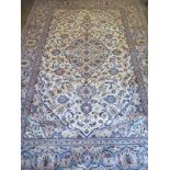 A Caucasian ground kashan rug, approximately 297 cm x 200 cm, in good condition