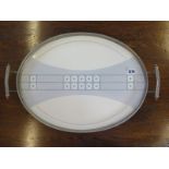 An oval tray with ceramic base, 55cm x 36cm - generally good