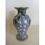 A 2003 Anita Harris designed vase with floral decoration, approximately 15.5 cm high, with some