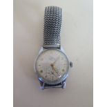 A gentlemens vintage Smiths wristwatch with Arabic dial and subsidiary dial, approximately 3.3cm