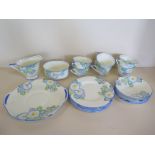 A part Royal Doulton Plaza tea service with six cups, six saucers, six tea plates, a twin handled