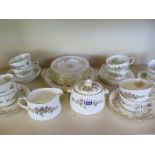 A Minton tea service - 38 pieces - all generally good, apart from a repaired saucer