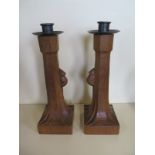 A pair of Robert Thompson of Kilburn Mouseman carved oak candlesticks with wrought iron pans and a