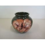 A small Moorcroft green ground vase - 8cm tall, good condition