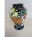 A Moorcroft 2006 second quality vase - 16cm tall - good condition