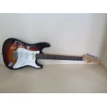 A Squire by Fender, Stratocaster in tobacco burst with rosewood fingerboard with soft gig bag,