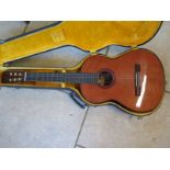 A Fender Classical guitar, with nylon strings and a hard case, low E string tuner head missing