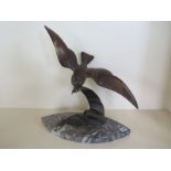 A bronze seagull on a marble base, 50cm tall, 48cm wide, good condition