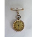 A 9ct yellow gold pocket watch with a 9ct pin, 35mm diameter, not working, total weight of watch