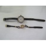 A continental silver cased wristwatch with painted Arabic dial and leather strap together with a