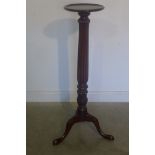 A mahogany torchere on tripod base, in good clean restored condition - 120cm H x 31cm diameter top