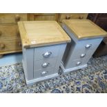 A pair of painted truffle bedsides