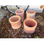 Four terracotta planters - diameter 23cm