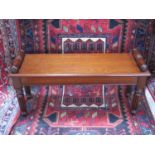 A Victorian style mahogany window seat on reeded legs, 104cm long x 50cm high - made by a local