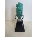 A malachite bust with silver 925 collar on a black marble base, 12cm tall, old repair to