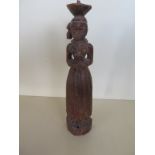 An antique carving of a woman - 29cm tall, please see images for condition