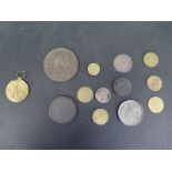 A small collection of tokens and coins, and a WWI medal to 23720 Pte A Gillspie S wales Bord - and a