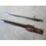 A 1913 pattern Remington sword bayonet, with scabbard, in overall good condition, some wear to