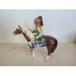 A Beswick Native American Chief on Skewbald pony, in full head dress 22cm tall - in good condition