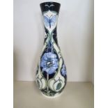 A Moorcroft Rachel Bishop study in a blue vase - 114/250 - 2005 - in good condition 43cm tall