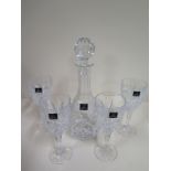 A Royal Doulton crystal gift ware set with decanter, four glasses and box, chip to underside of