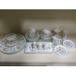 A part Minton Haddon Hall service including - four dinner plates, six tea plate, five saucers, seven