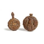 Two early 19th century French carved coquilla nut flasks, one with a native American Indian, the