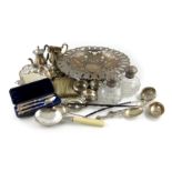 λ A mixed lot, comprising silver items: a pair of late-Victorian silver-mounted cut-glass scent