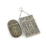 A late 19th century silver filigree card case, unmarked, probably Indian, rectangular form, hinged