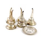 A collection of five old Sheffield plated wine funnels and one wine funnel stand, circular form, all