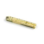 λ A Victorian novelty ivory folding ruler pencil, unmarked, rounded rectangular form, with a slide-