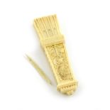 λ A 19th century carved ivory needle case, carved as a rectangular quiver of arrows, one side with