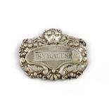 A 19th century silver 'slot-in' wine label, unmarked, shaped oval form, with a lion head and