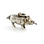 A Victorian novelty silver pencil, unmarked, modelled as a pig, with a ring attachment, length