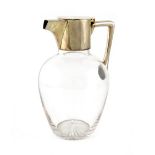 An Edwardian silver-mounted glass claret jug, by Heath and Middleton, Birmingham 1902, in the