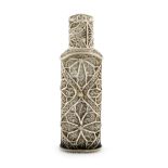A George III silver filigree scent bottle, unmarked circa 1770, oval cylindrical form, with a pull-