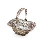 A Dutch silver filigree swing-handled basket, 1911, rounded rectangular form, the swing-handle