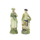 A pair of Ralph Wood figures of a gardener and his companion, c.1780-90, he leaning on a spade and