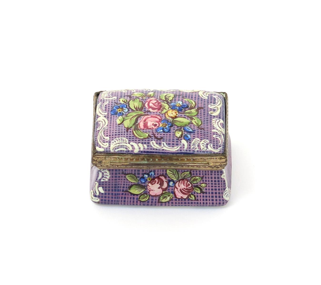 A Bilston enamel patch box, c.1780, the rectangular form painted with raised sprays of flowers