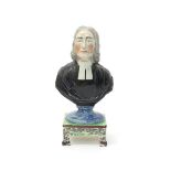 An Obadiah Sherratt pearlware table base bust of Reverend John Wesley, c.1820, modelled in his later