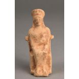 A Greek terracotta figure of Dementer sitting on a throne, wearing a polos headdress and holding a