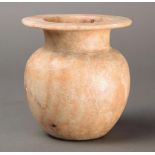 An Egyptian alabaster pot the ovoid body with a wide rim, 11.5cm high.