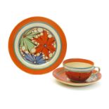 'Broth' a Clarice Cliff Bizarre Globe cup, saucer and side plate, painted in colours printed factory