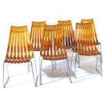 A set of six stacking chairs designed by Hans Brattrud, the bentwood slat seats on chrome frame,