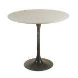 An Arkana Tulip table designed by Eero Saarinen, enamelled metal base supporting round, laminated