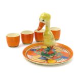 'Melon' a Clarice Cliff Duck egg cruet set, comprising tray, painted in colours inside orange