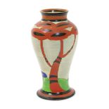 'Applique Red Tree' a Clarice Cliff Bizarre Mei Ping vase, painted in colours between red and