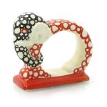 'Bubbles' a rare Clarice Cliff Elephant napkin ring, painted in shades of Coral red and black,