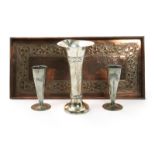 A pair of Liberty English Pewter spill vases, model no.0821, flaring cylindrical form, cast in low